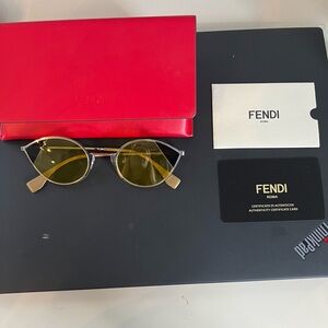 FENDI sunglasses: silver metal yellow cat eye